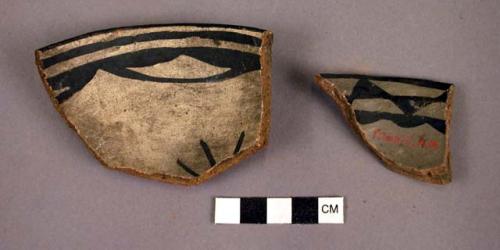 Ceramic bowl rim sherd, black on white, geometric design