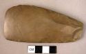 Cast of : stone axe or chisel