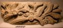 Fragment of sculptured ornament, with tenon; feathers