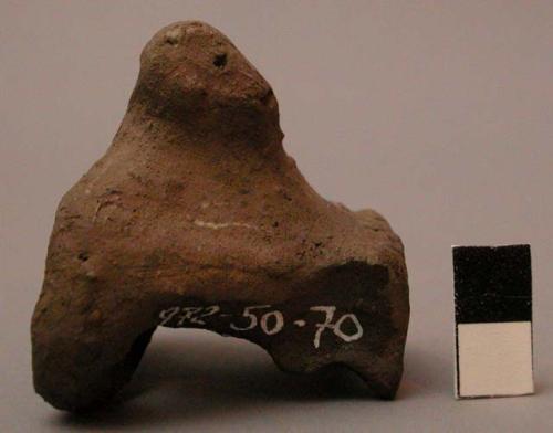 Figurine, ceramic, kneeling with arms behind back, incised features