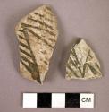 Ceranuc rim and body sherds, black on white, linear design