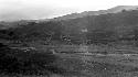 River with rocky plain and hills