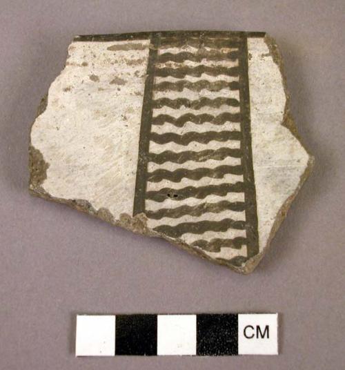 Ceramic rim sherd, black on white, geometric design