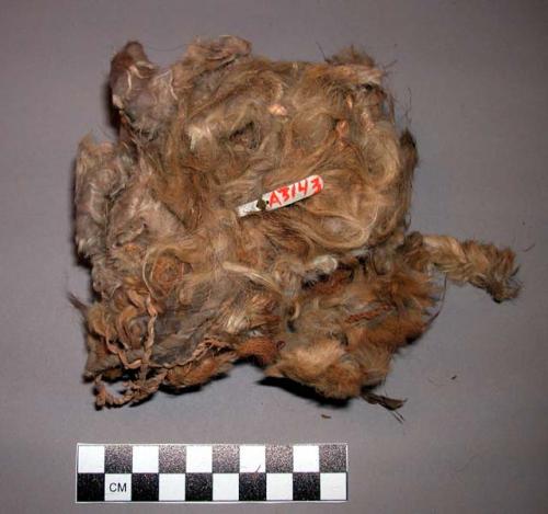 Fragment of fur string robe