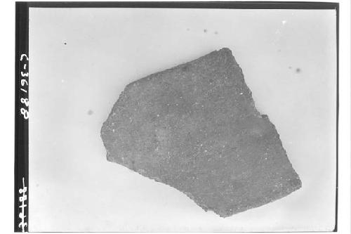 Structure 3 E 3.  Slab of pottery found in fire-box of chamber.  Not complete.