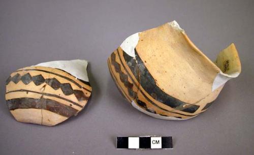 Part of small jeddito black-on-yellow pottery jar