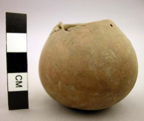 Small gourd with cover attached by string