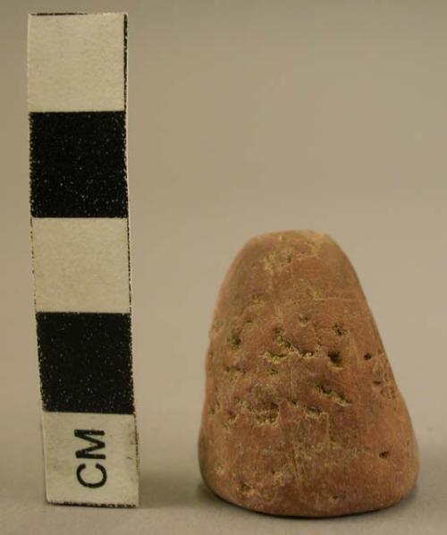 Cone-shaped incised clay object