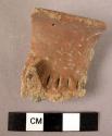 Rim potsherd with lug and incised decoration - brown slip