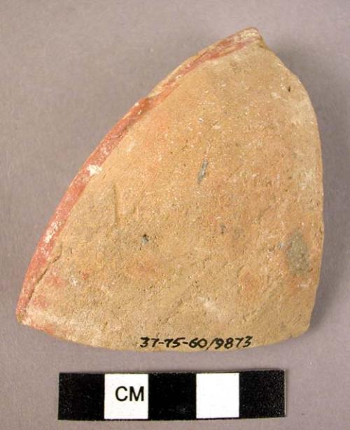 Rim potsherd from bowl - showing flat brown painted rim