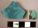 2 glazed potsherds