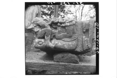 Sculptured stone with seated figures