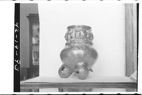 Plumbate vessel, bulging neck, tripod. Max. ht. 15.6cm., max. diam. 12.0cm. Colo