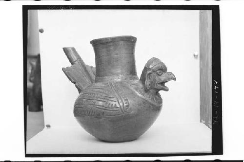 Plumbate spouted bird vessel.