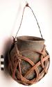 Pottery vessel with bamboo carrying sling