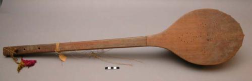 Wooden musical instrument, lute-shaped, strings of sheep, goat, or deer gut