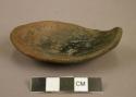 Small plain pottery ladle