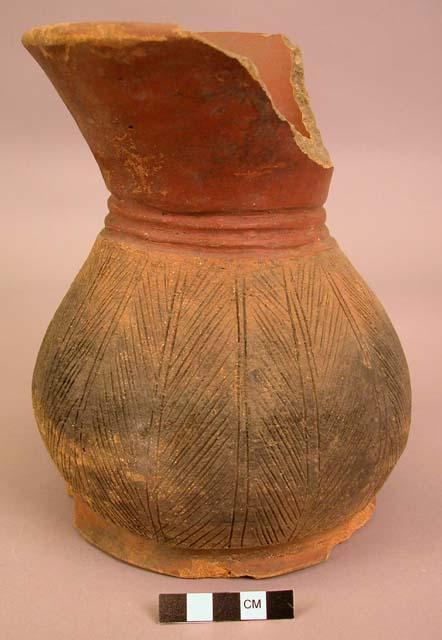 Large jar, red ware.  Incised decoration.