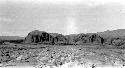 Rocky plain, river and cliffs in distance