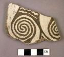 Ceramic body sherd, black on white, spiral design