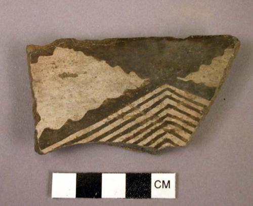 Ceramic rim sherd, black on white, geometric design