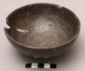 1 black pottery bowl