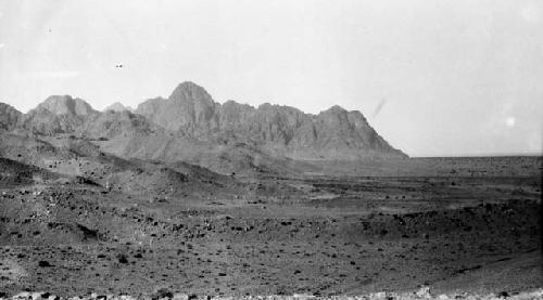 Desert landscape, with mountains in the background