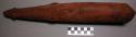 Wooden club - red with carved face