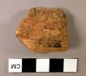 Fragment of worked wood
