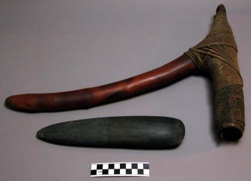 Adze (yara) - wooden handle with black stone blade, raffia wrapped around base o