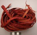 Woman's red braided fibre belt