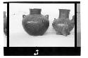 a. Plumbate ware jar: incised pattern with conventionalized serpent heads in med