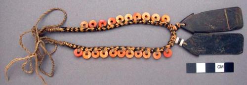 Bead necklace with tortoise shell pendant