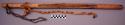 Loom, portion of, carved wood dowel, center groove, leather strap one end
