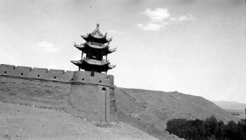 Wall and tower with pointed roofs