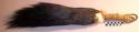 Feather whisk (?) (sue' lare') - black-brown feathers; white fur band; yellow br
