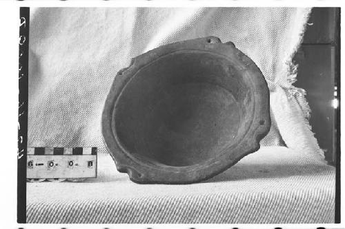 Tripodal pottery bowl.