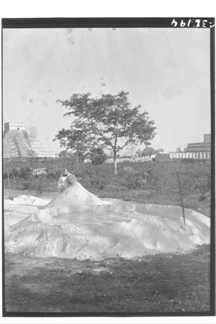 Workmen mixing mortar at structure 3E3