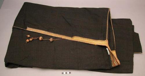 Large robe of black wool with gold embroidery