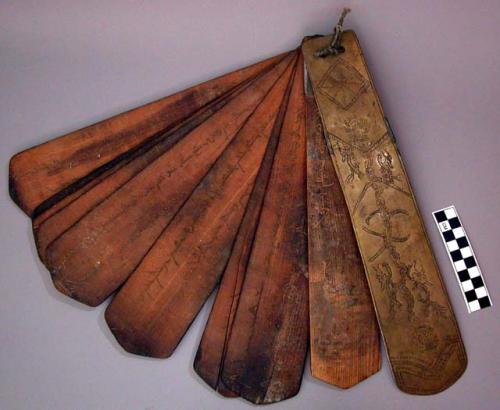 9 wooden tablets used in ancestor ceremony bound into 1 book with metal cover