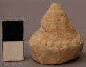 Tsats of clay, votive simplification of dagoba.
