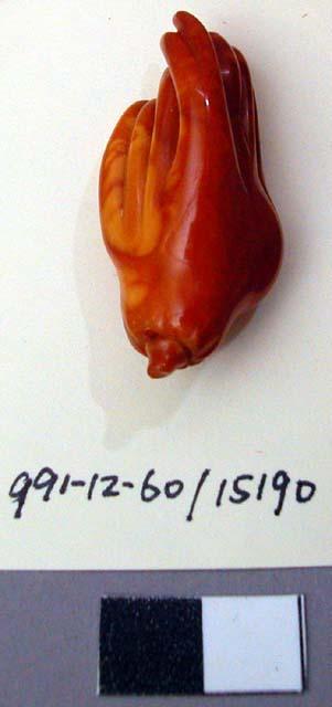 Amber-Colored (Plastic?) Amulet in the Shape of 'Buddha's Hand'