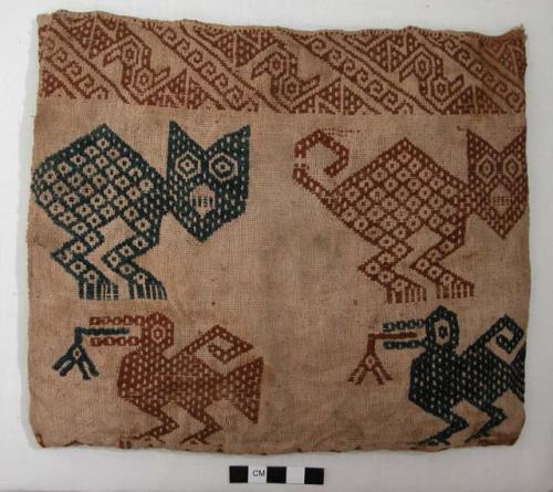 Organic, woven fiber, sewn bag, tan weave, blue, brown, feline, bird figures