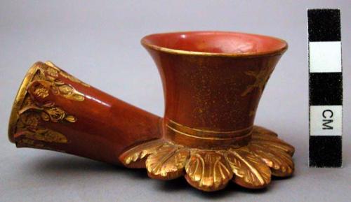 Pipe, moulded ceramic bowl, red with gold, biomorphic designs, chipped