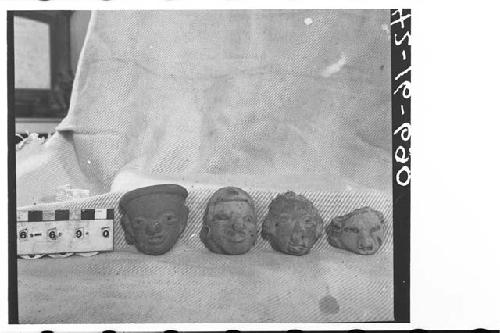 Four Pottery Figurine Heads