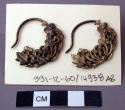 Pair of White Metal Openwork Earrings with Bat and Floral Motifs