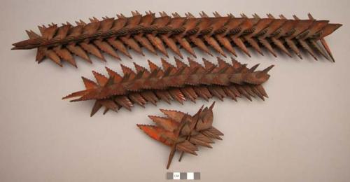 Carved wooden object (broken in 3 pieces) - carved leaf-like pieces +