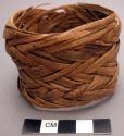 Bracelet, wide ring of woven reed strips