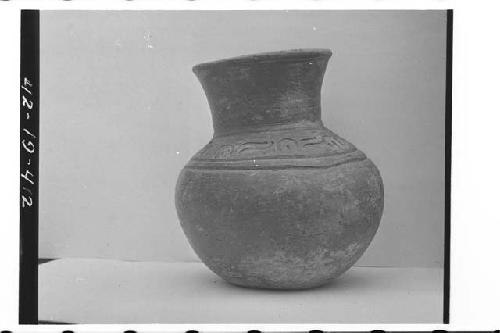 Plumbate standard jar, upper shoulder incised.