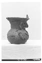 A-1-565 Tloloc Jar. Height 16.5. Right Profile